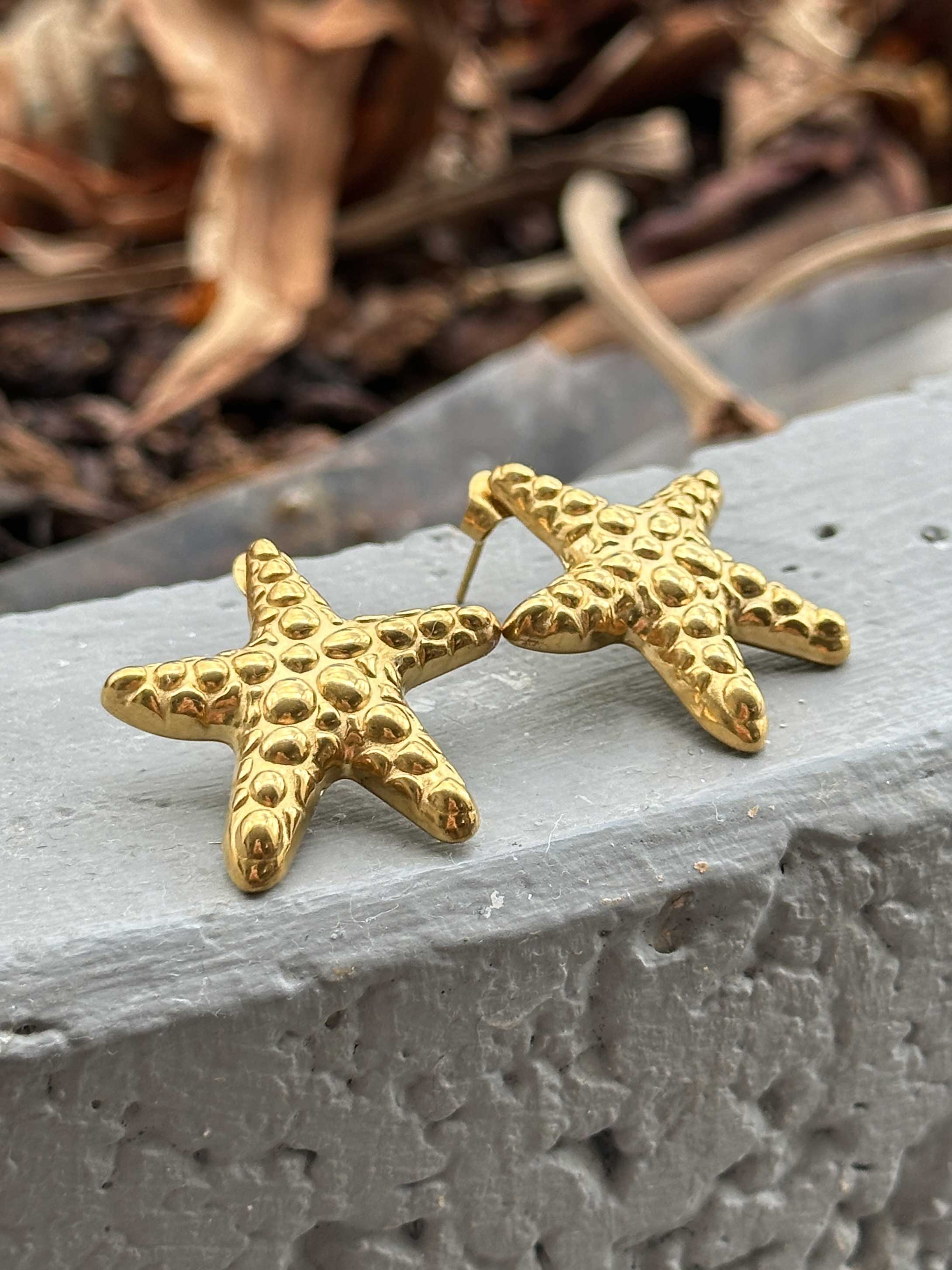 Norla - Guldfarvede søstjerne øreringe